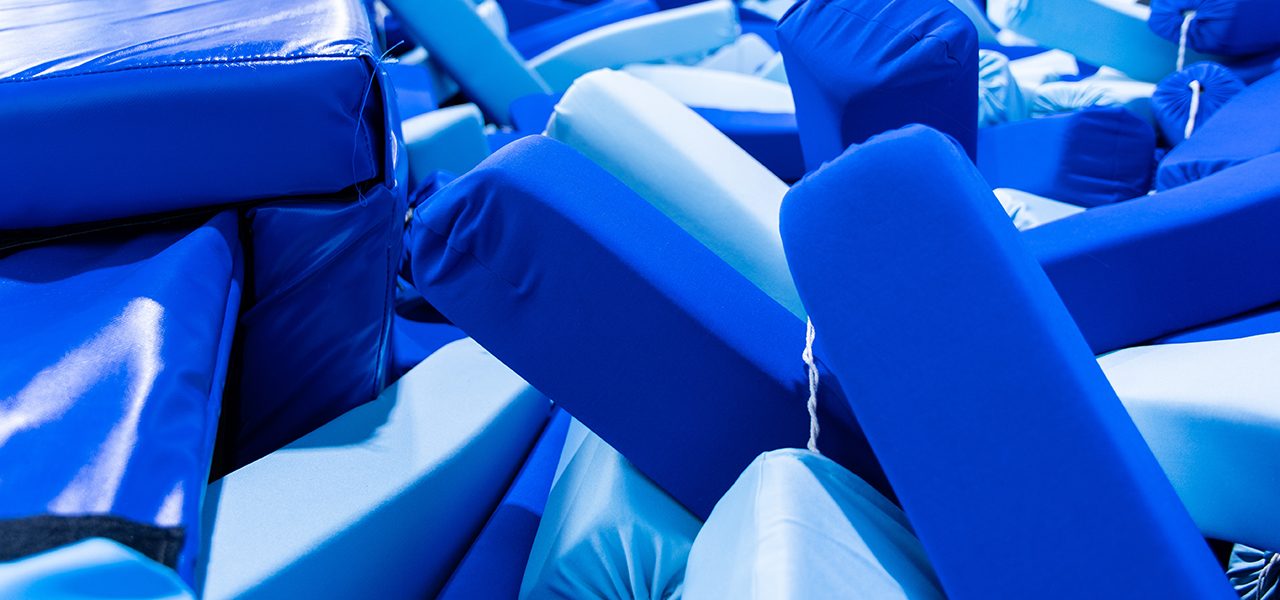 Blue and pale blue foam blocks with fitted fabric covers